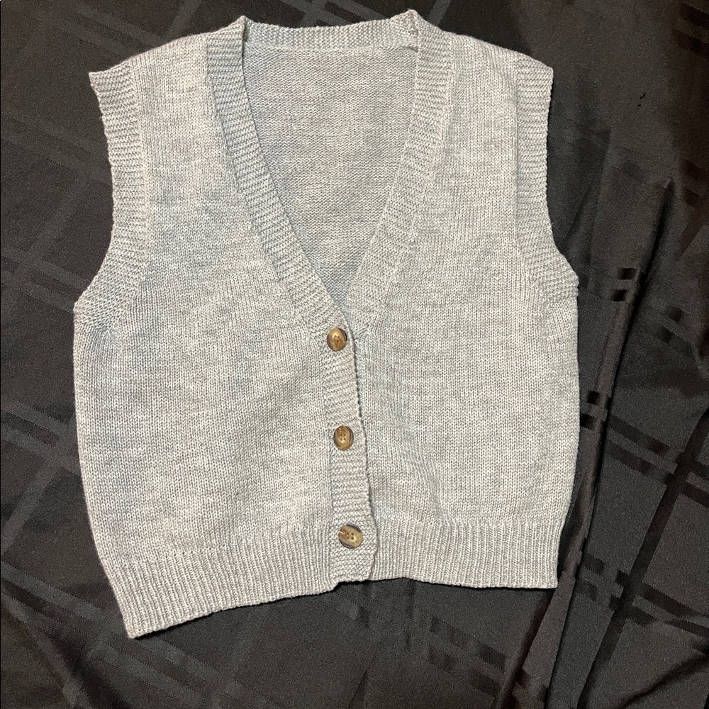 Light gray button up vest